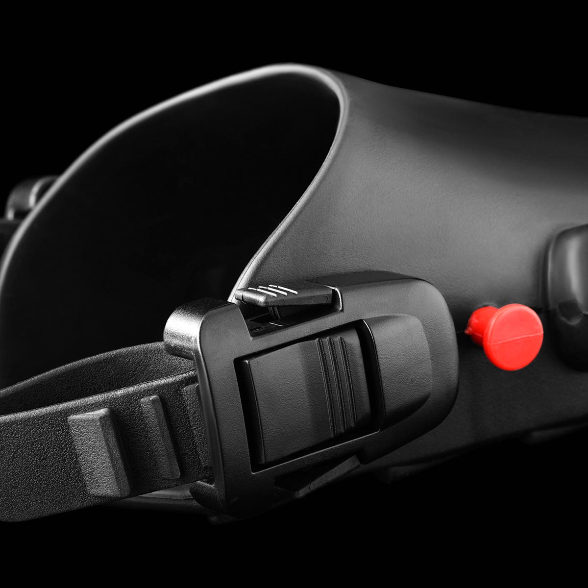 Atomic Aquatics Open Heel SplitFin buckle closeup image on black background