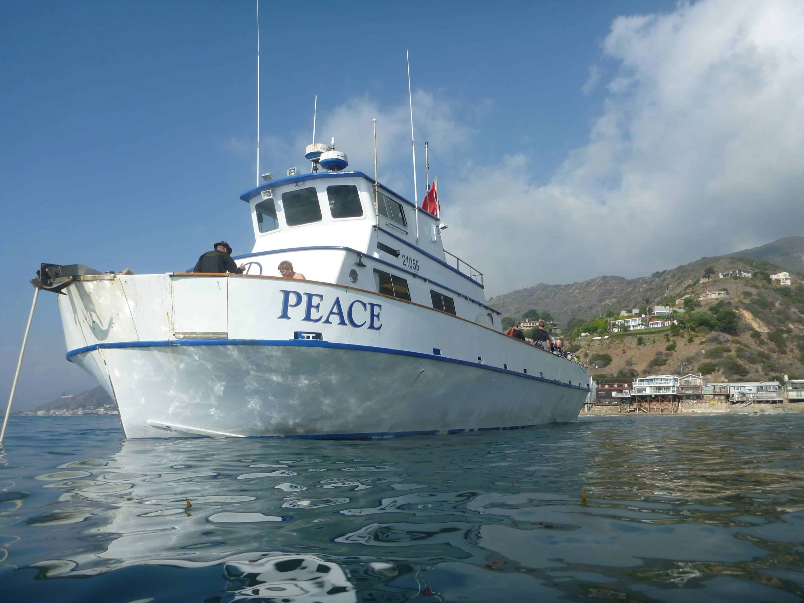 image of dive boat named Peace on the water
